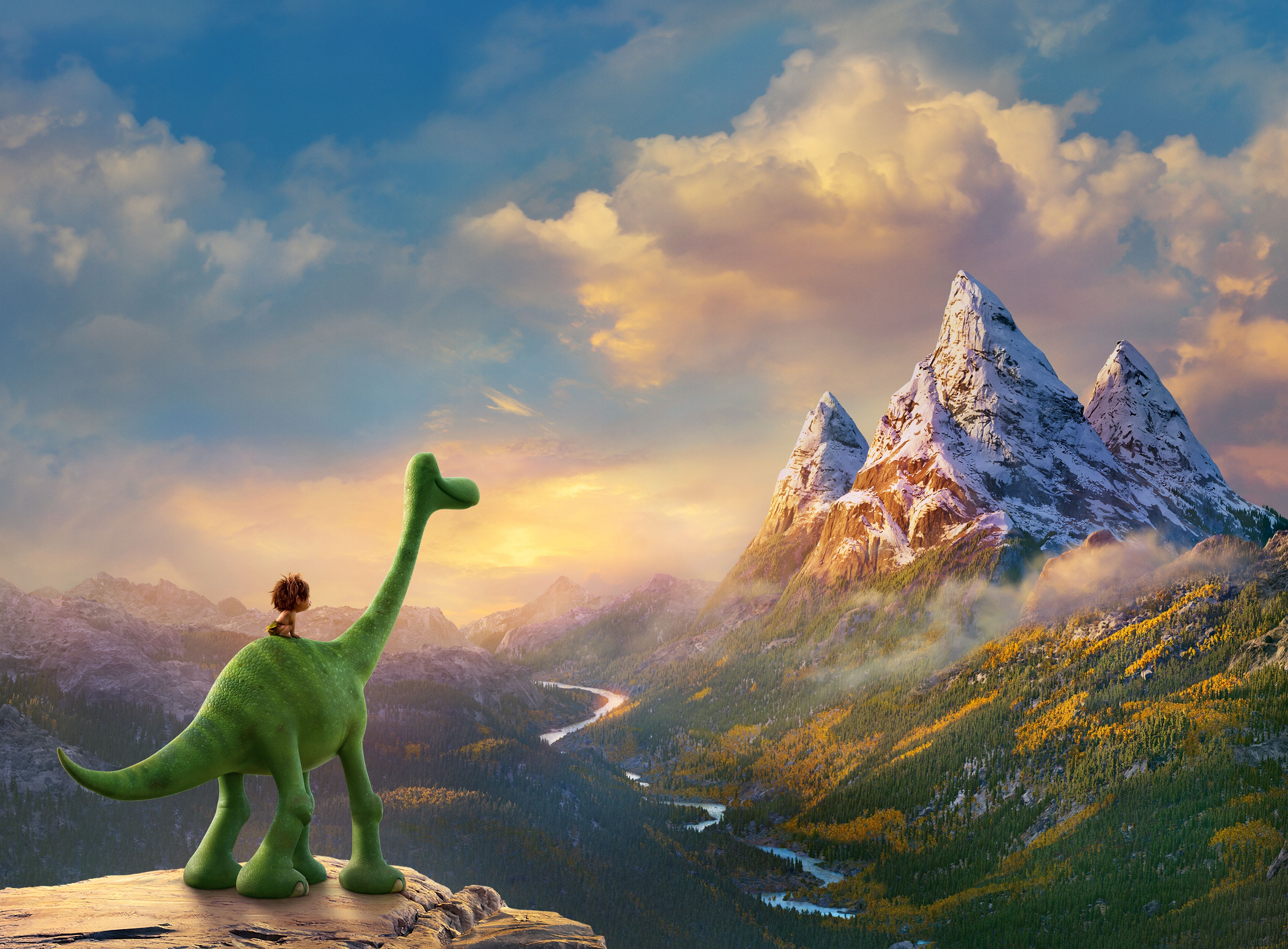 The Good Dinosaur's protagonist Arlo and deuteragonist Spot gaze out over a lush mountain range from atop a hill. 