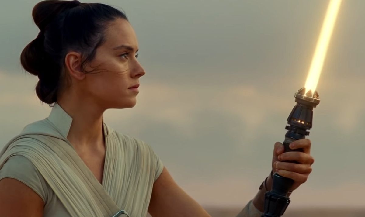 Rey and her yellow lightsaber in Rise of Skywalker