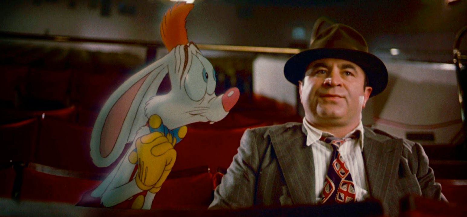 Roger Rabbit and Eddie Valiant in a theater in 'Who Framed Roger Rabbit'.