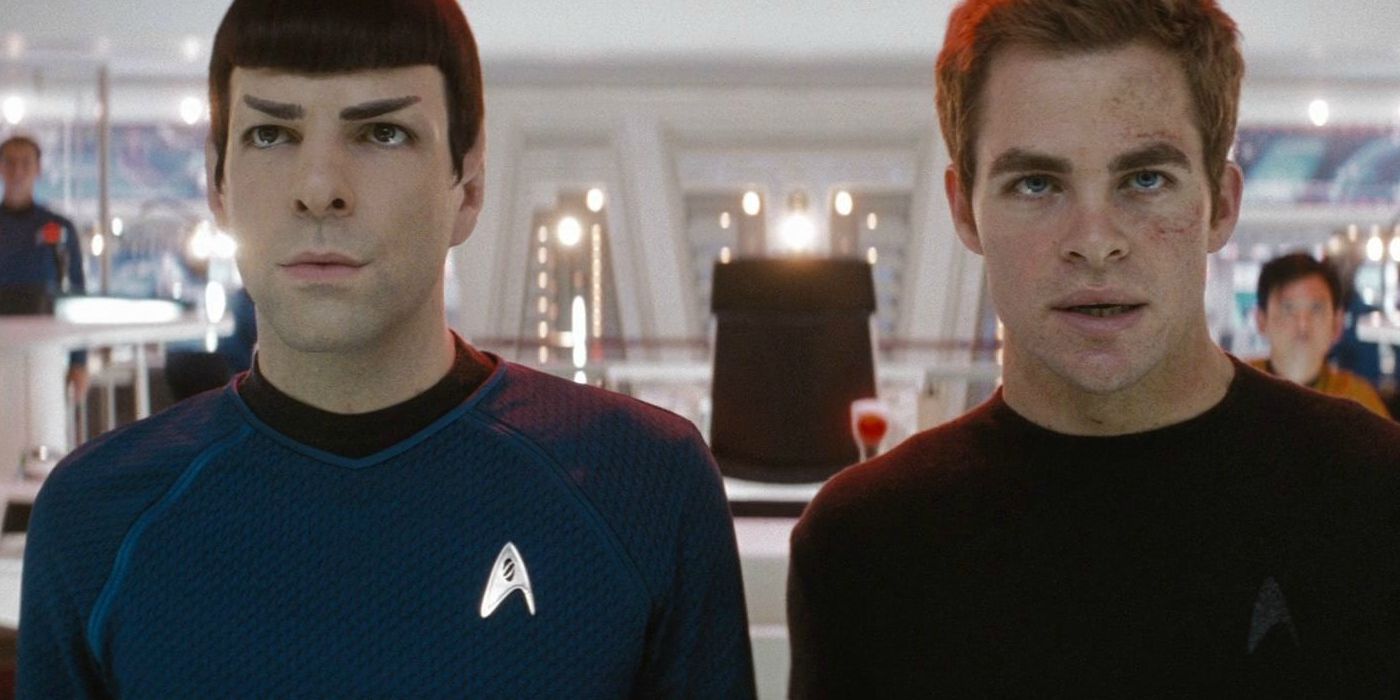 Spock and Kirk standing in a defiant position in the finale of Star Trek (2009)