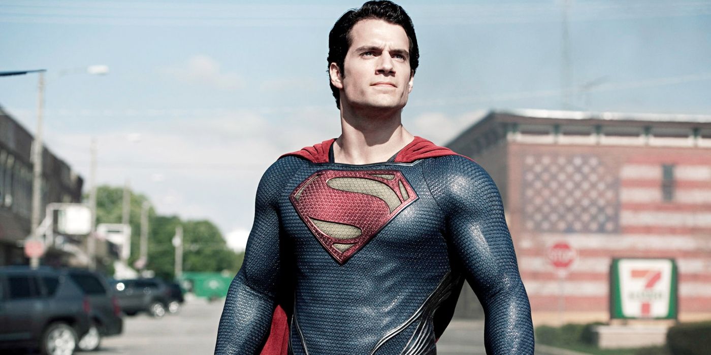 Henry Cavill as Superman looks up and stands proudly in Man of Steel