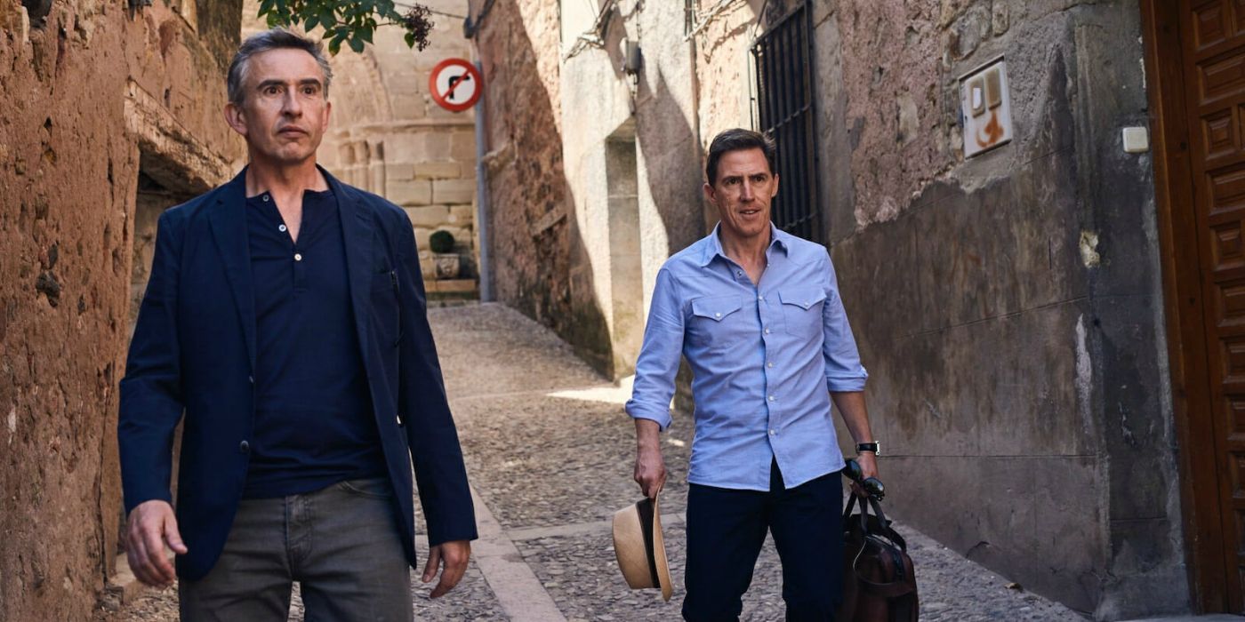 Steve Coogan and Rob Brydon as themselves standing in an alley looking ahead in The Trip to Greece