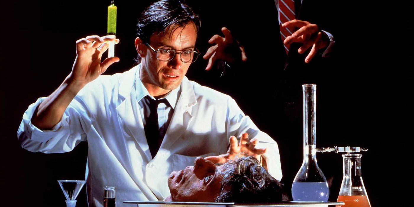 Jeffrey Combs operating on a severed head in Re-Animator