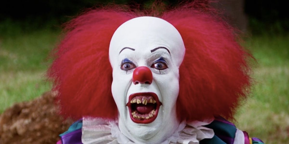 Tim Curry as Pennywise in It