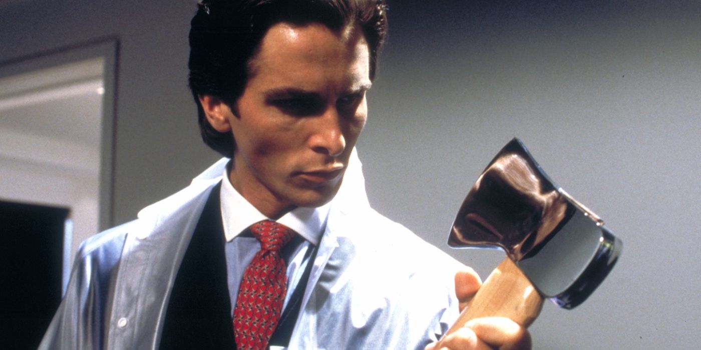 Christian Bale as Patrick Bateman, holding an axe and looking menacing in American Psycho