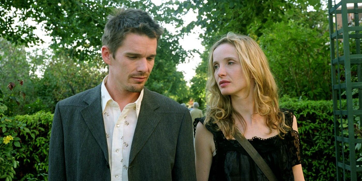 Ethan Hawke and Julie Delpy as Jesse and Celine walking down a park in Before Sunset.