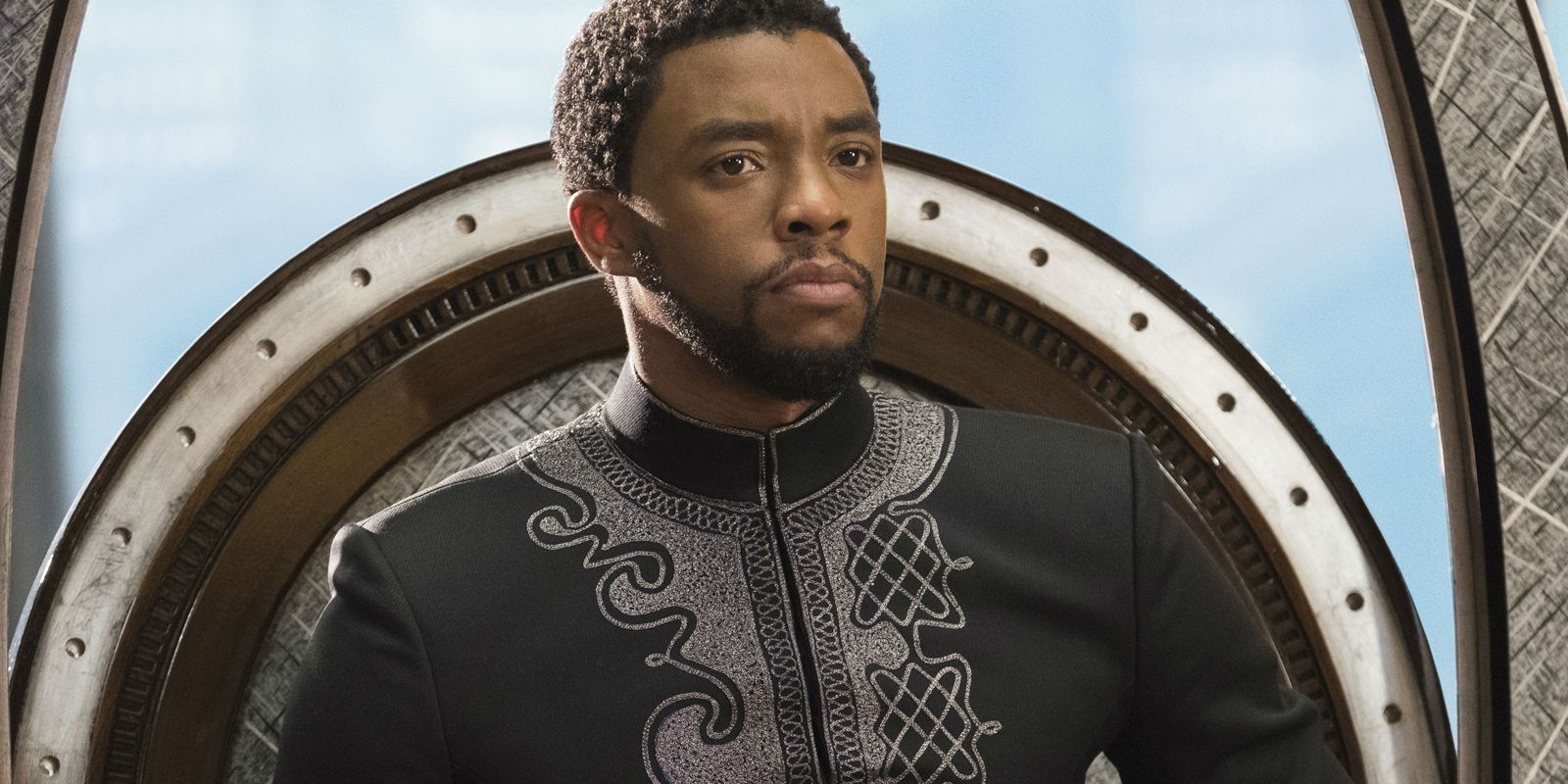 King T'Challa sitting on his throne in Black Panther.