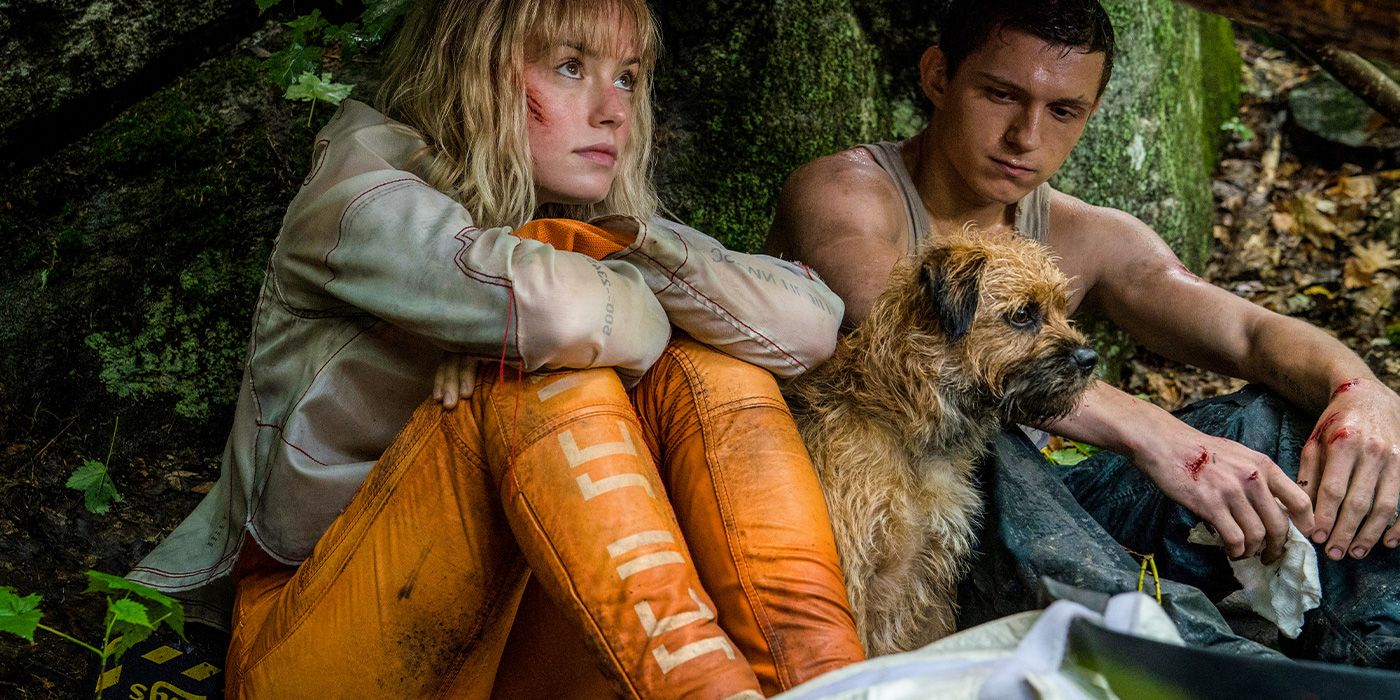 Daisy Ridley and Tom Holland with a dog in a forest in Chaos Walking