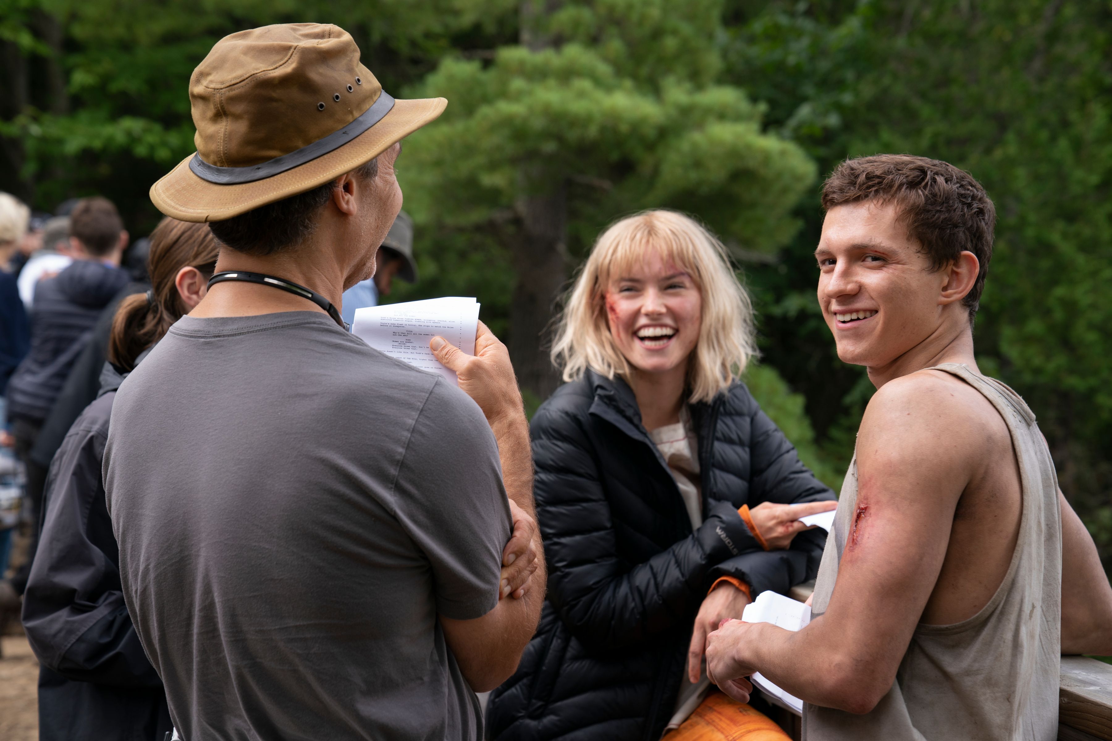 Director Doug Liman, Daisy Ridley, and Tom Holland on the set of Chaos Walking