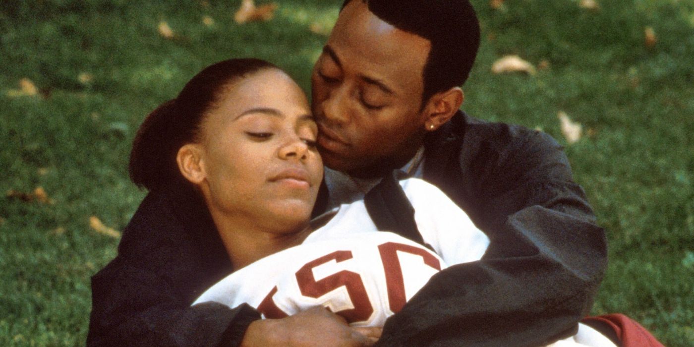 Monica and Quincy embracing in Love & Basketball.