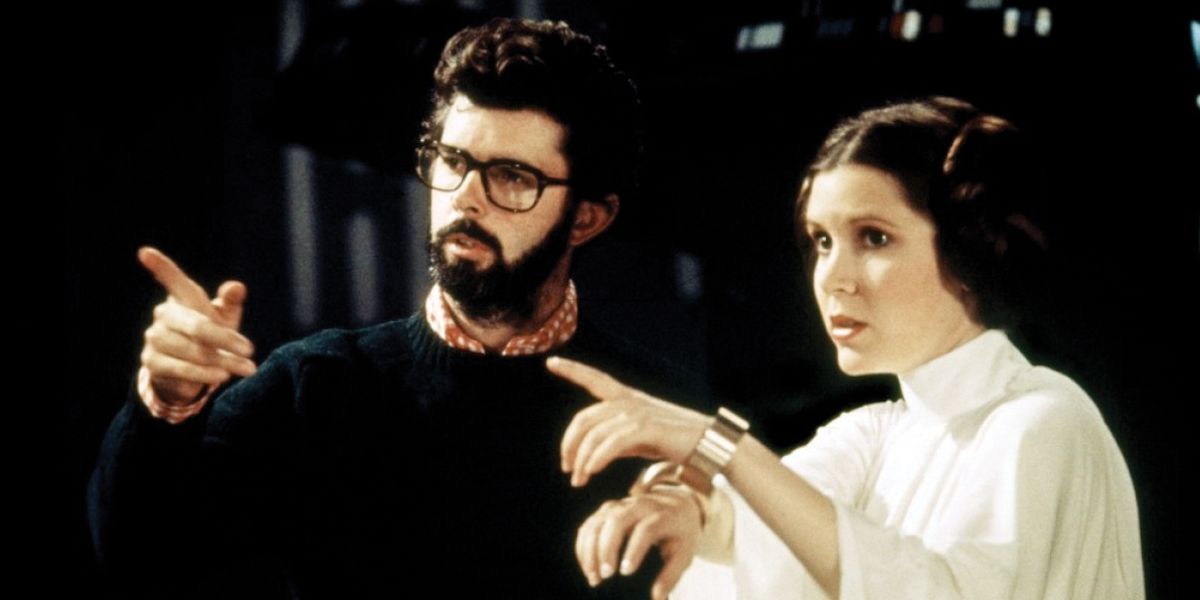 George Lucas and Carrie Fisher on the set of Star Wars