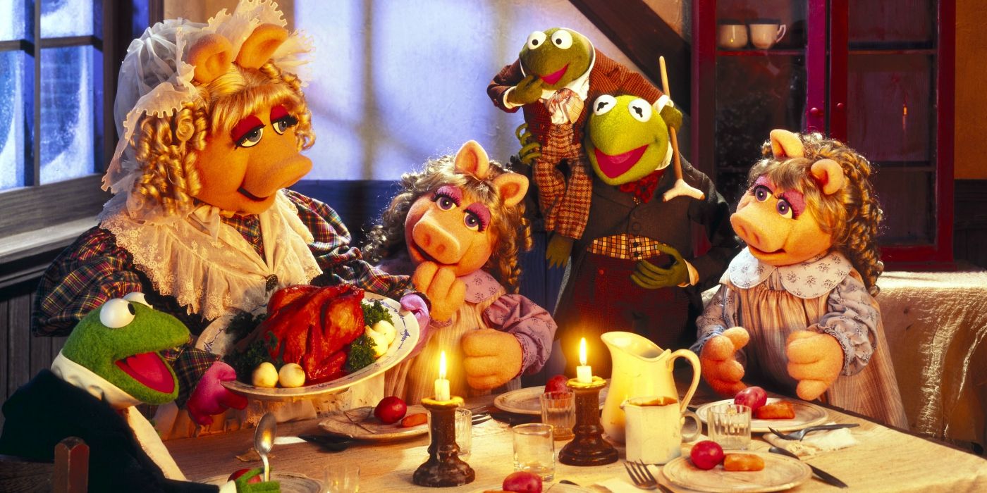 Miss Piggy, Kermit the Frog, and the gang eat dinner during The Muppet Christmas Carol.