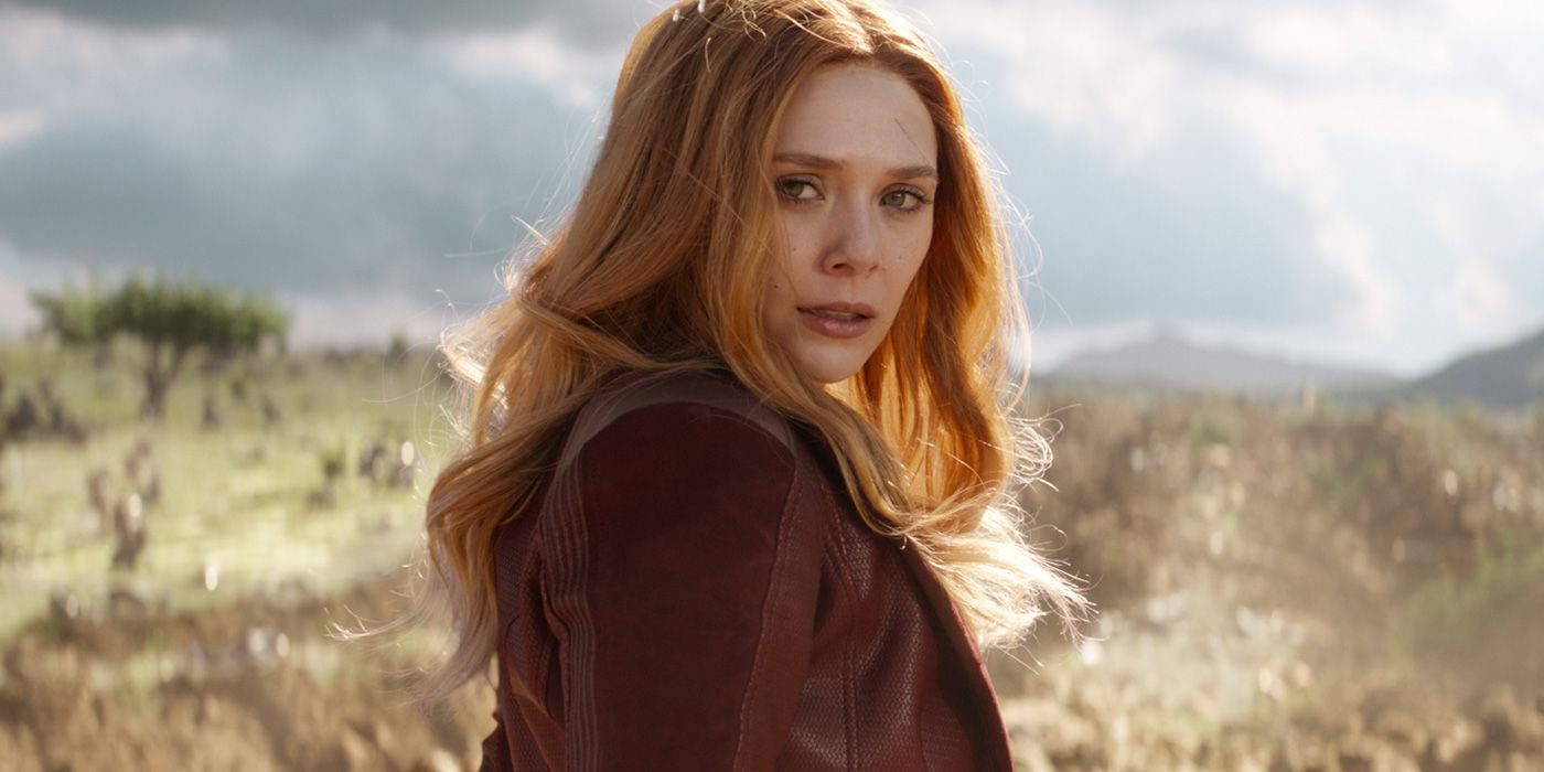 Scarlet Witch (Elizabeth Olsen) standing in a field in Avengers: Infinity War