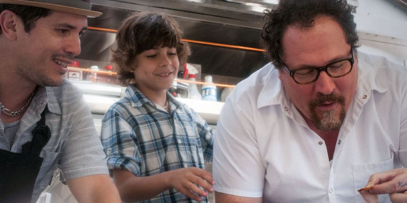 John Leguizamo and Jon Favreau cook inside a food truck in Chef.