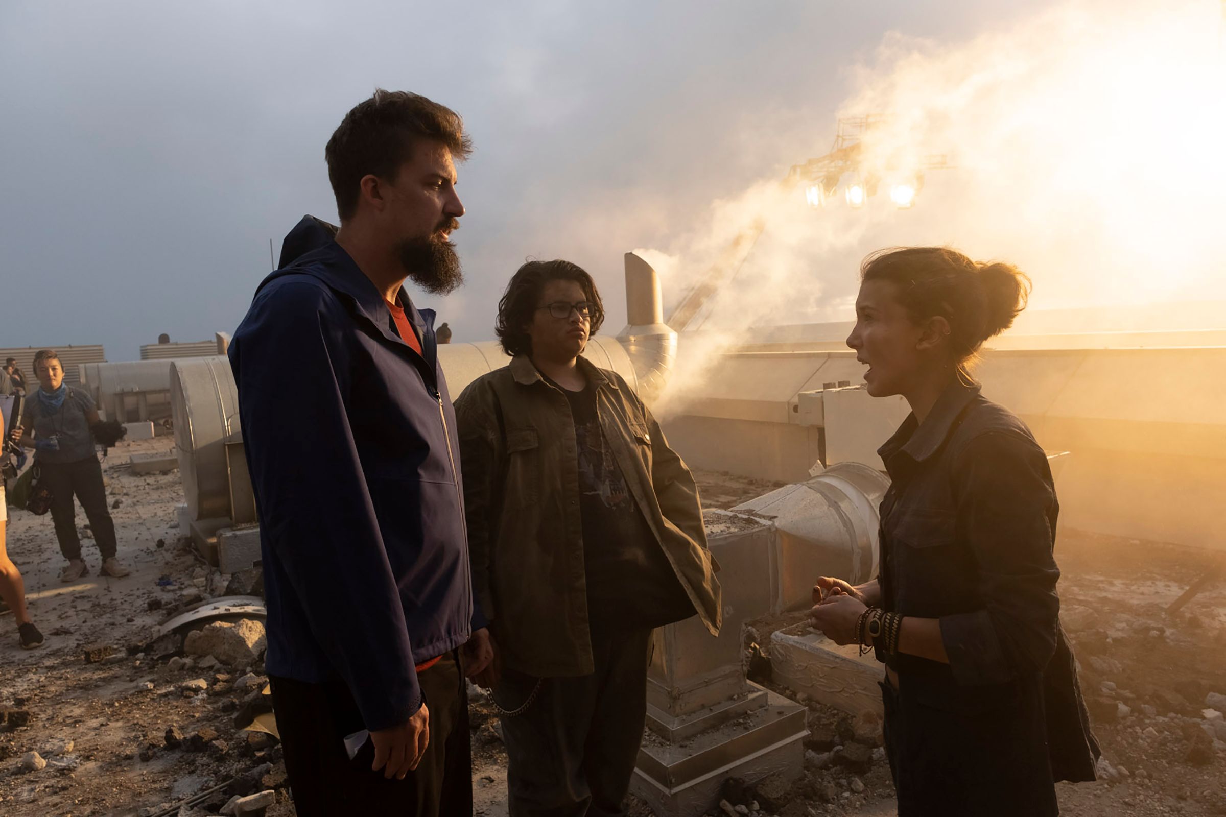 Director Adam Wingard with Millie Bobby Brown and Julian Dennison on the Set of Godzilla vs. Kong