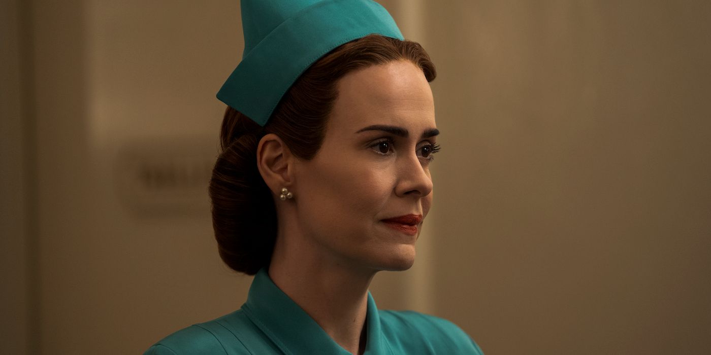 Sarah Paulson as Nurse Mildred Ratched smiling feintly in Ratched