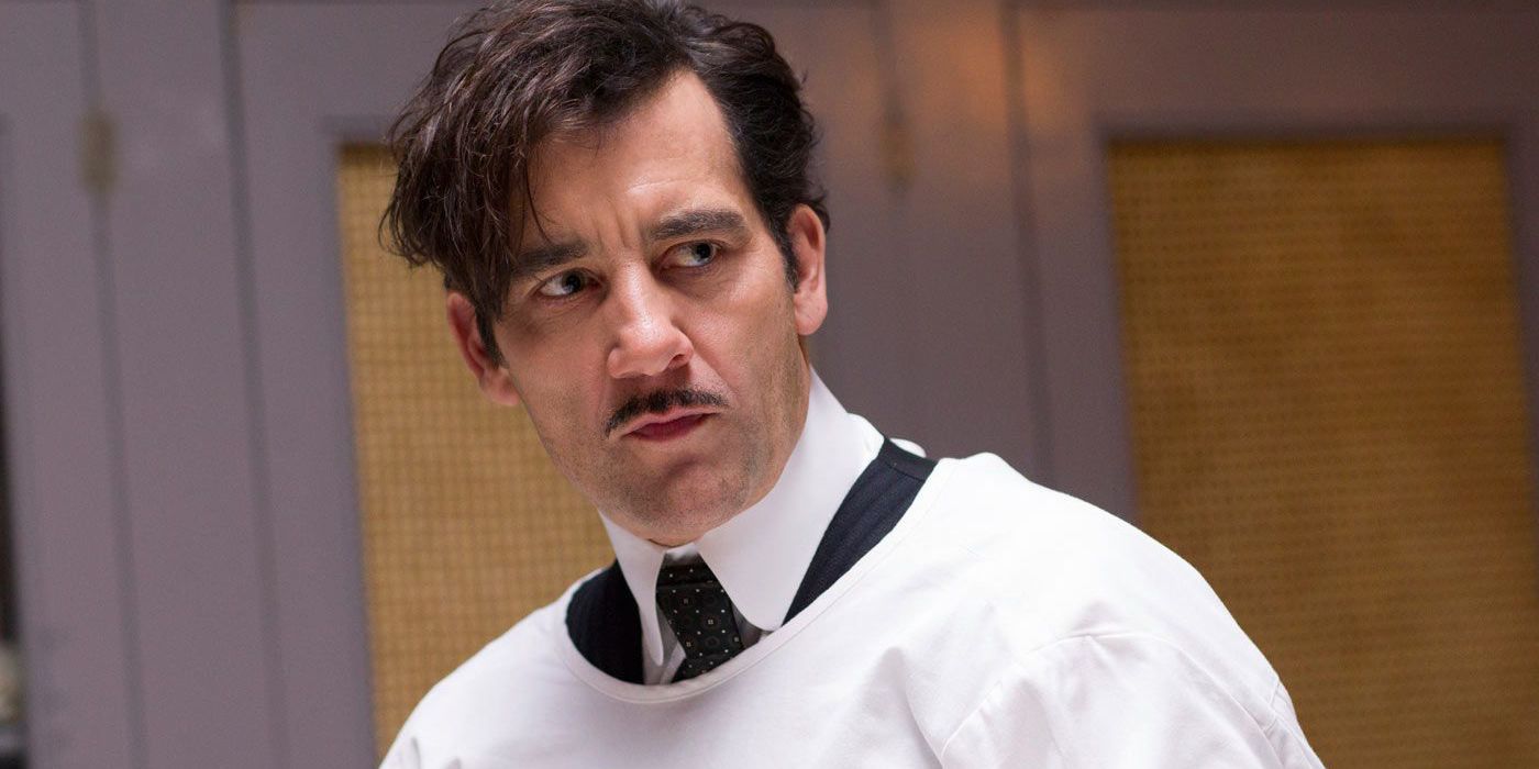 Thack looking seriously at something off-camera in The Knick.