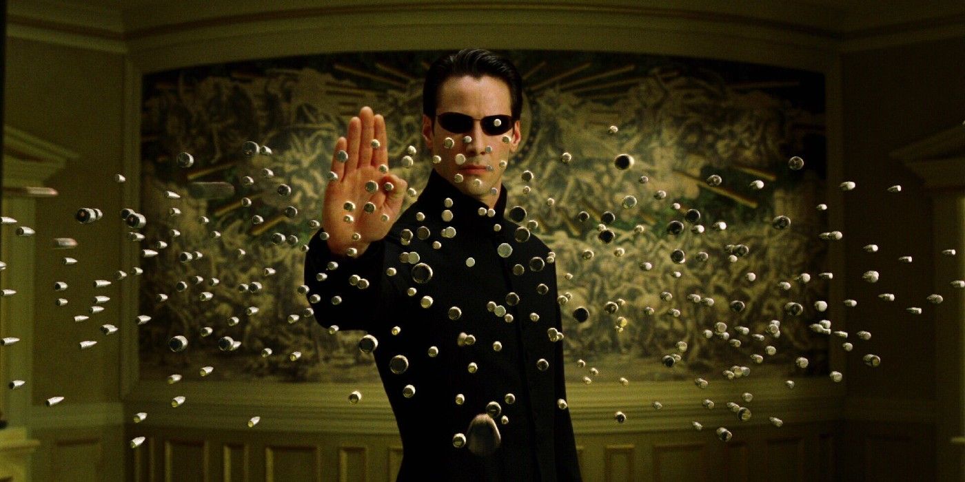 Keanu Reeves as Neo stops bullets in The Matrix Reloaded. 