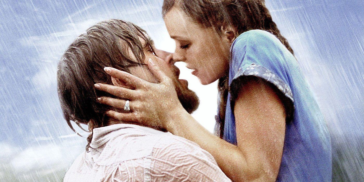 Ryan Gosling holding Rachel McAdams in his arms before they are about to kiss in the rain in 'The Notebook'