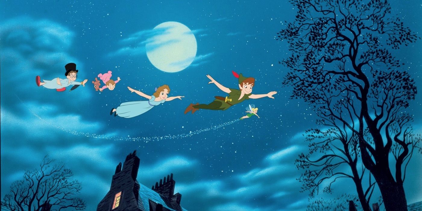 Peter Pan, Wendy, and Tinker Bell flying through the sky in the 1953 Peter Pan