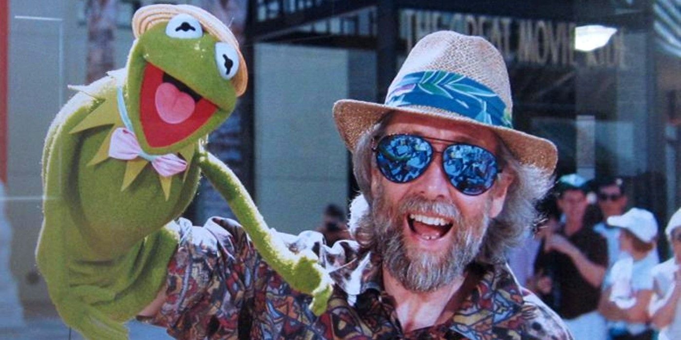 Jim Henson smiling alongside Kermit the Frog