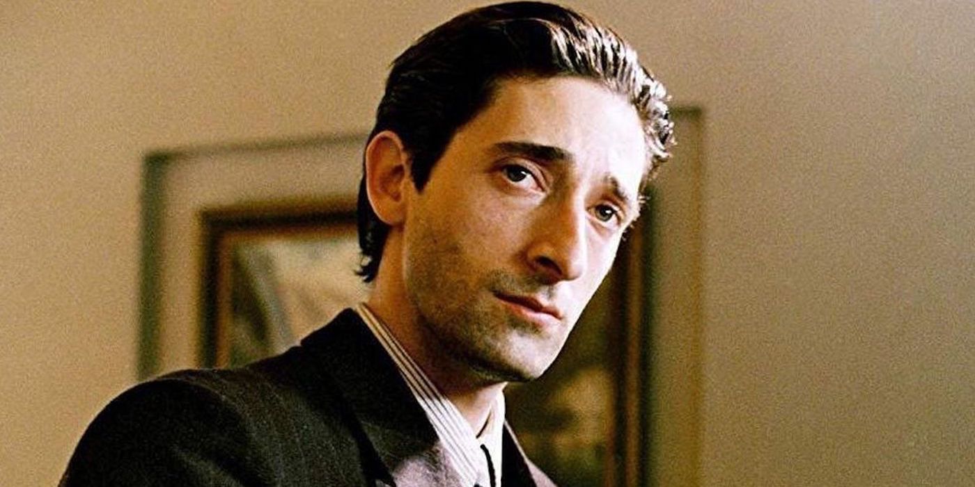 Adrien Brody as Waldyslaw looking intently at something off-camera in The Pianist.