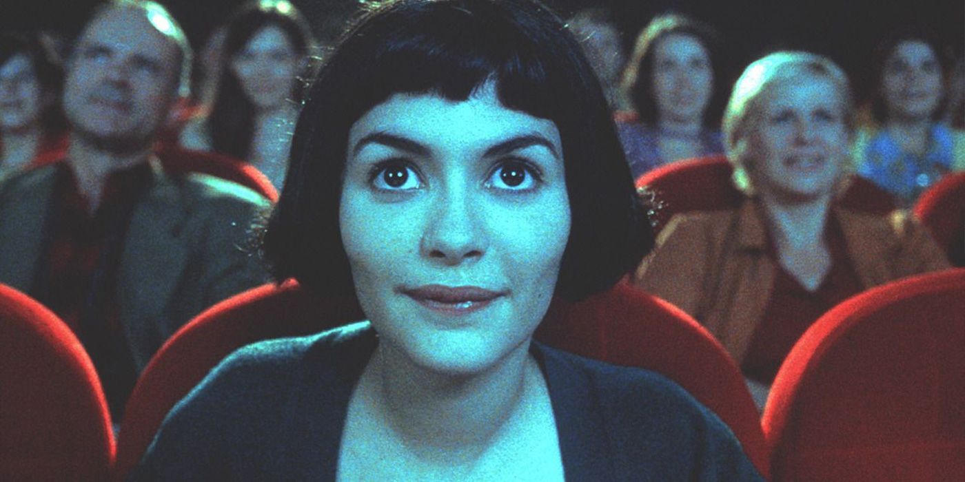 Audrey Tautou watches a film in the cinema in Amelie