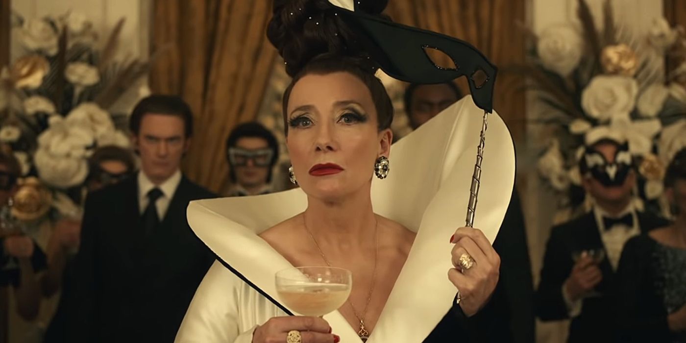 Emma Thompson as the Baroness at a masked ball in Cruella.