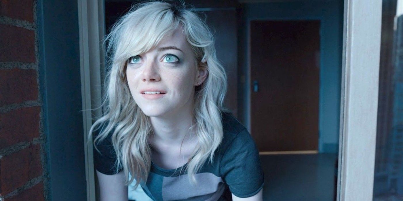 Emma Stone as Sam smiling and looking out a window in Birdman
