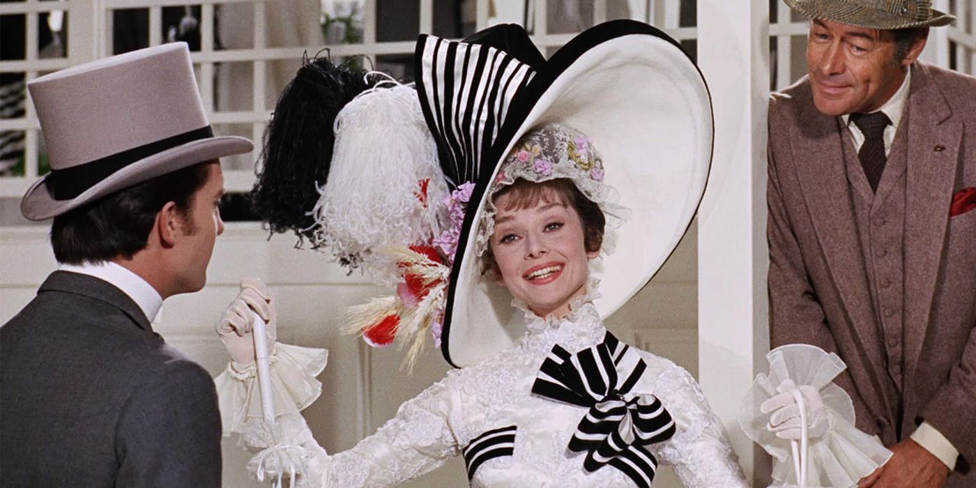 Audrey Hepburn as Eliza Doolittle smiling in My Fair Lady.