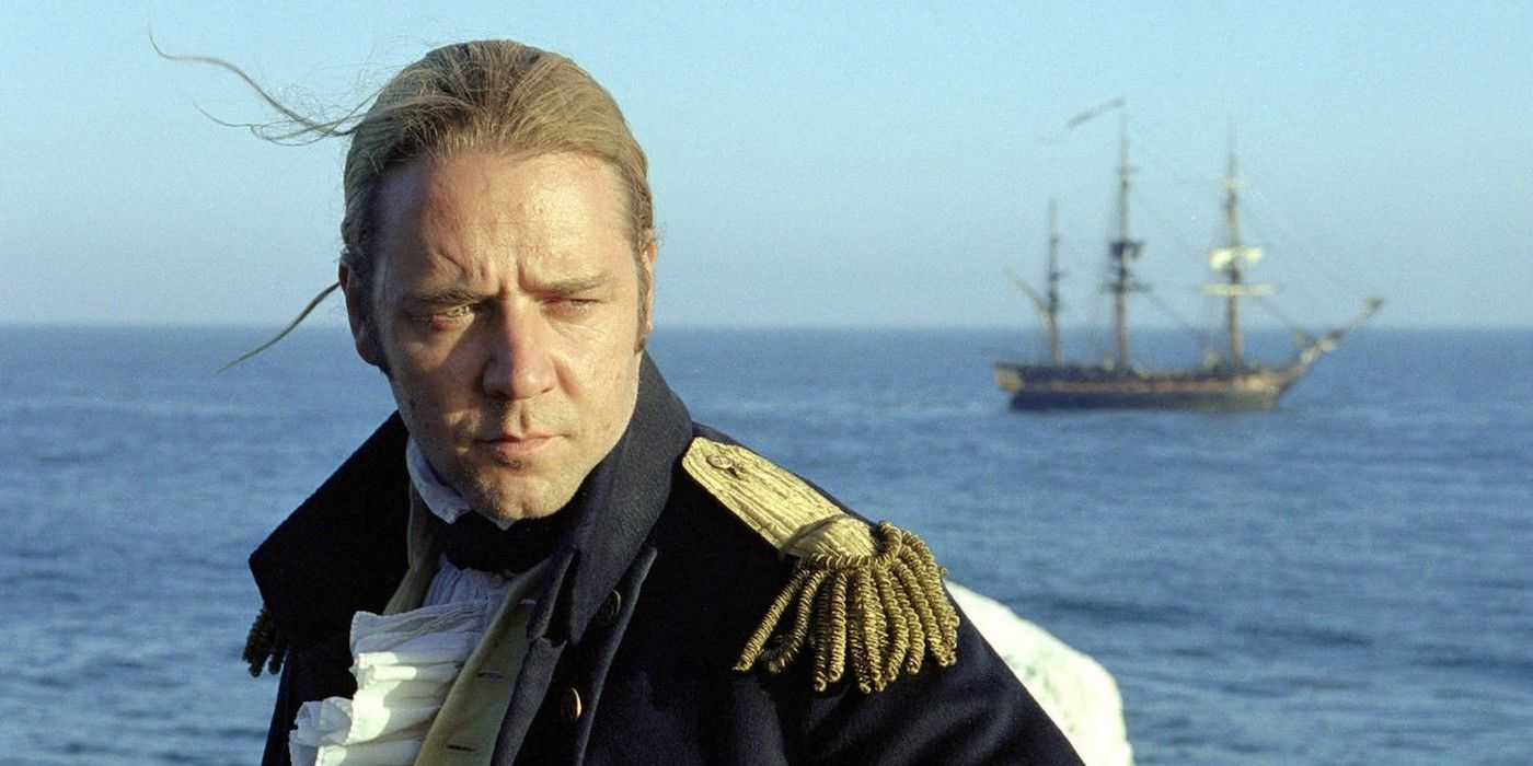 Jack Aubrey at sea looking to the distance in Master and Commander