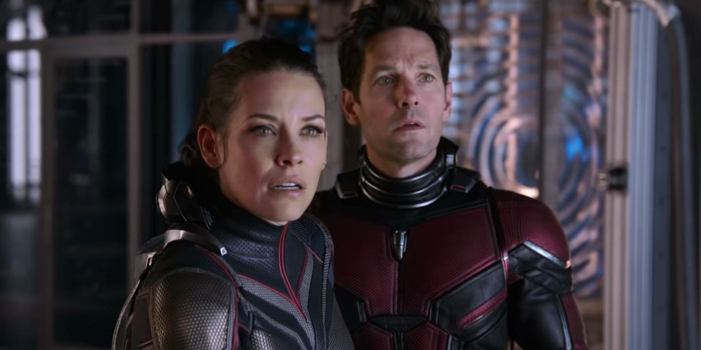 Hope and Scott in their suits but without their helmets on looking in the same direction in Ant-Man and the Wasp.
