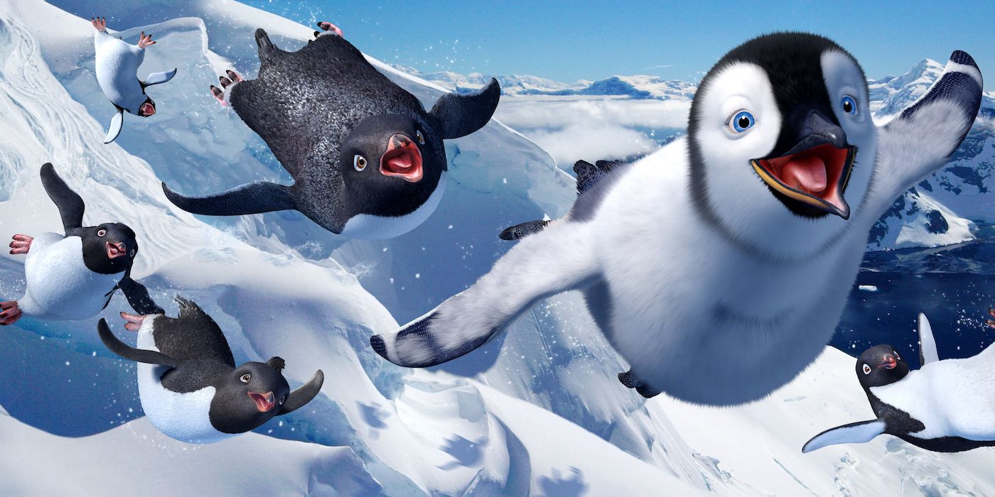 Several penguins sliding across the air smiling in Happy Feet