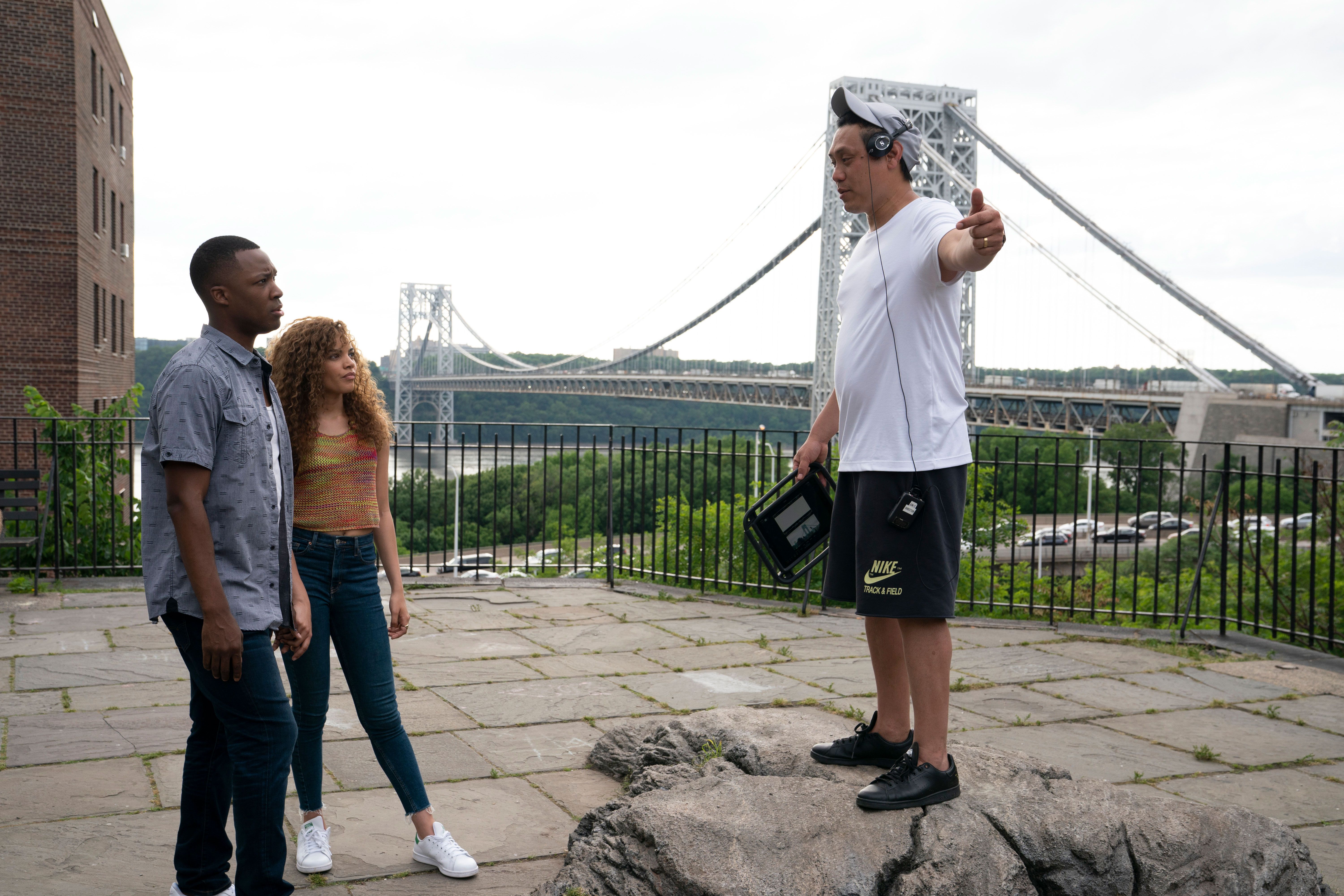 Corey Hawkins, Leslie Grace and Jon M. Chu on the Set of In the Heights.