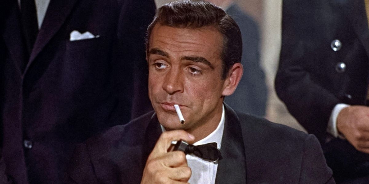 Sean Connery as James Bond lighting a cigarette in Dr. No