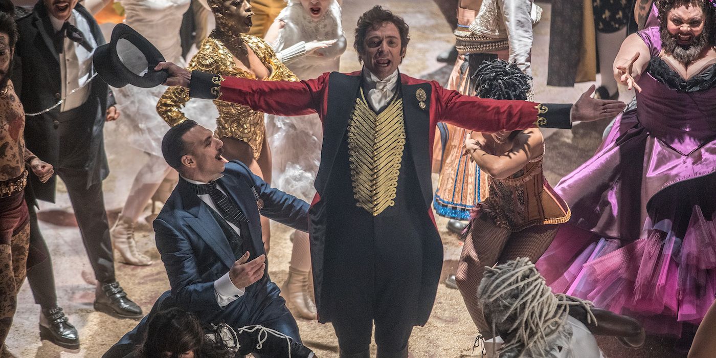 P.T. Barnum performing surrounded by his "freak" performers in The Greatest Showman.