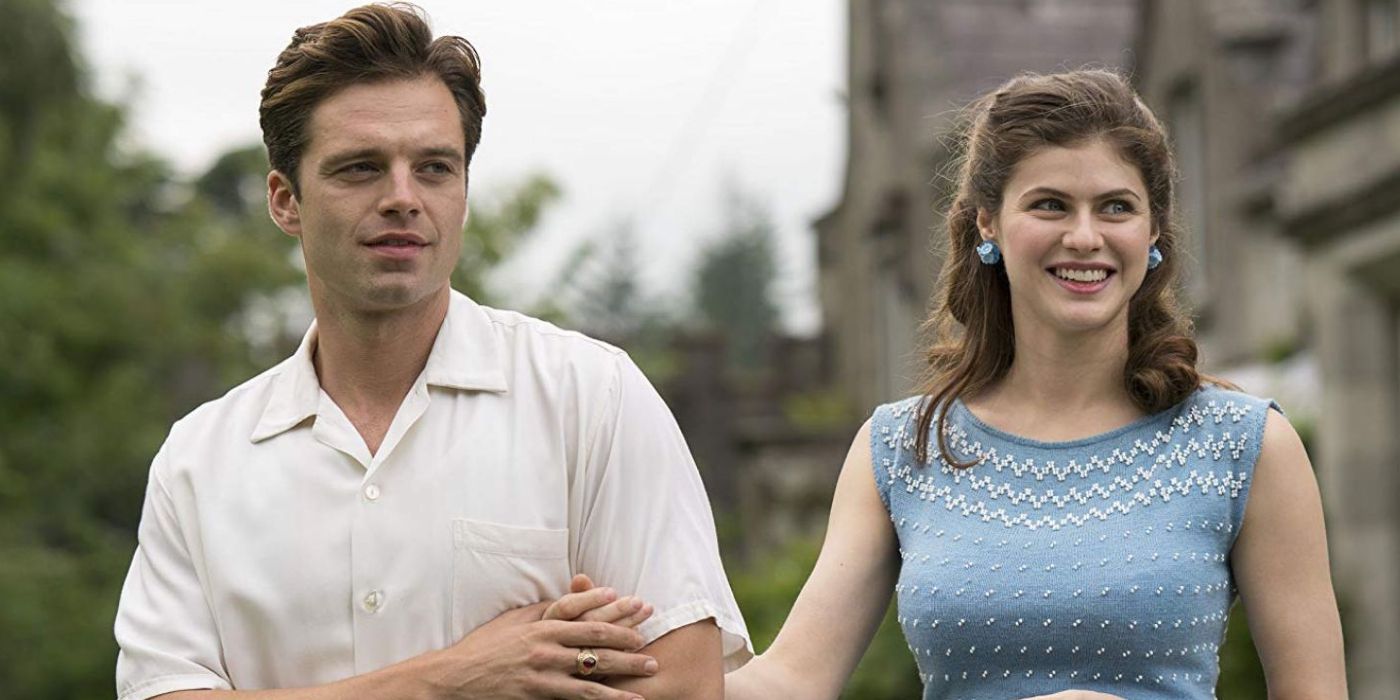 Sebastian Stan and Alexandria Daddario as Charles and Constance Blackwood hold each other near the castle in We've Always Lived in the Castle