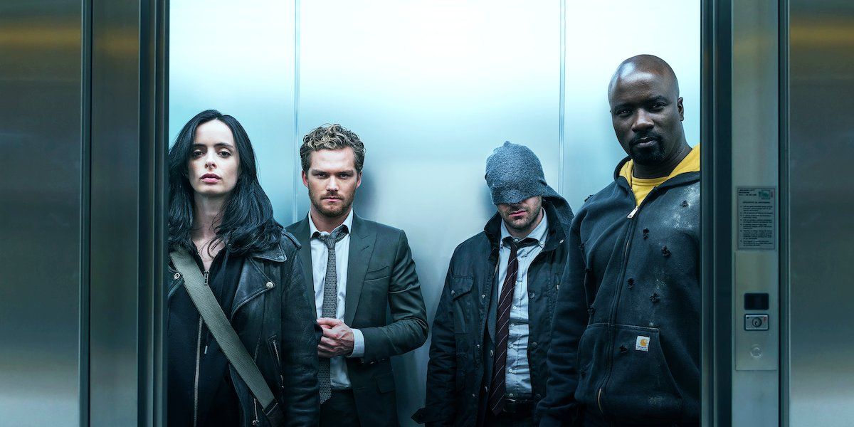 Krysten Ritter, Finn Jones, Charlie Cox, and Mike Colter in an elevator in The Defenders