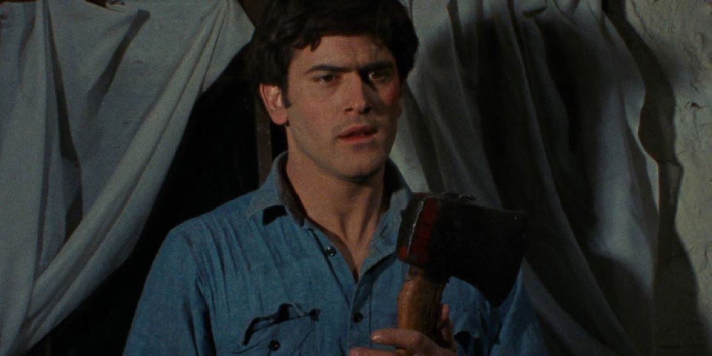 Bruce Campbell holding an axe in The Evil Dead