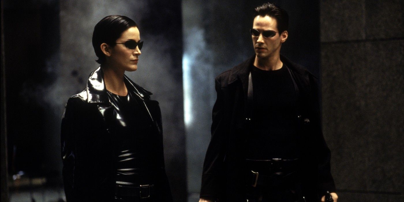 Carrie-Anne Moss as Trinity and Keanu Reeves as Neo in The Matrix