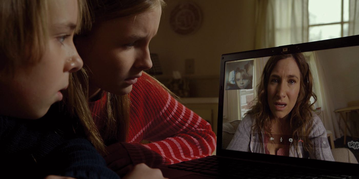 Two children video chatting with their mother in 'The Visit'