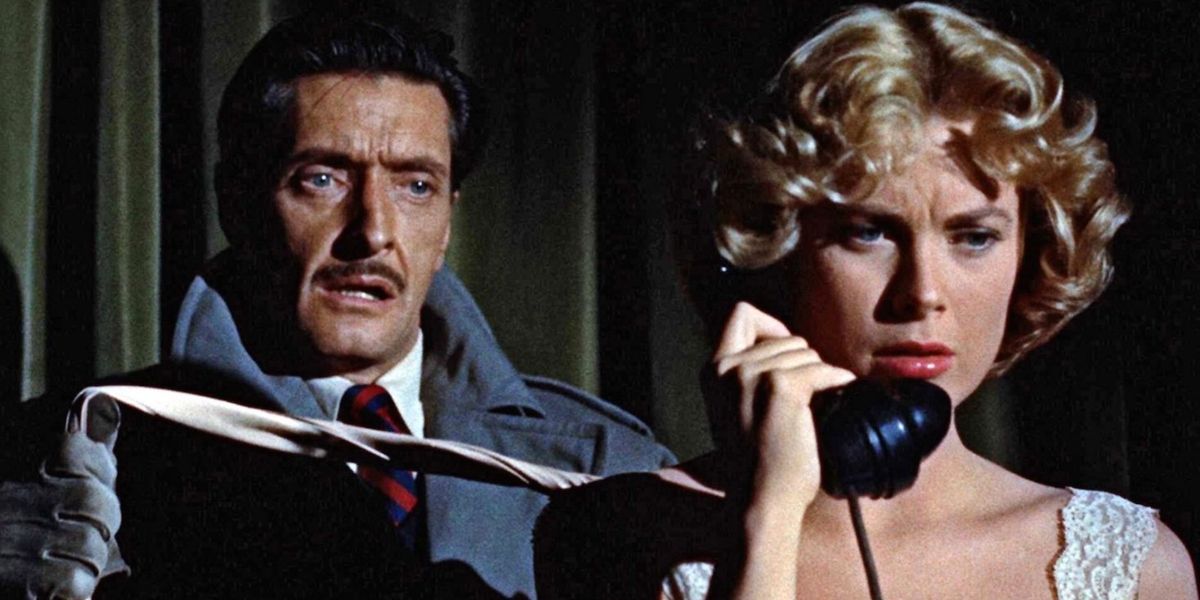 Margot, played by Grace Kelly, talking on the phone while Charles Swann, played by Anthony Dawson, stands behind her holding a scarf getting ready to strangle her in 'Dial M for Murder.' 