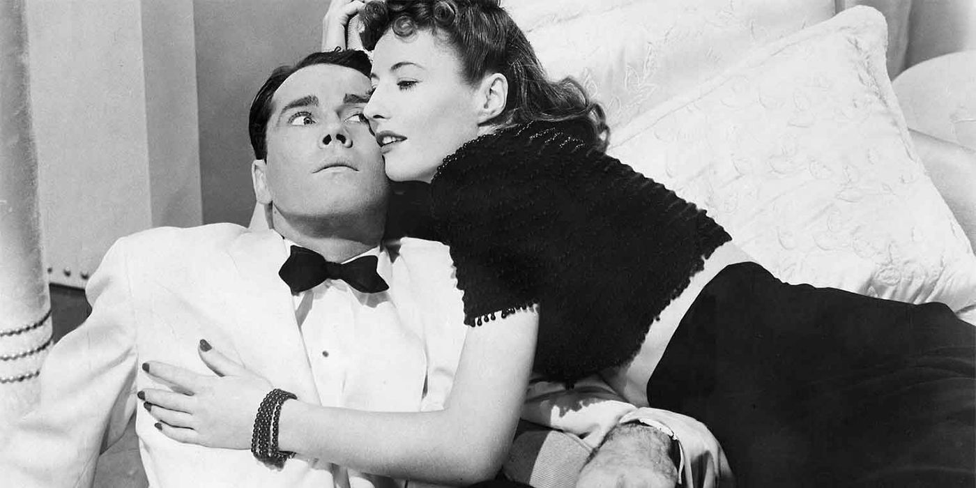 Henry Fonda and Barbara Stanwyck as Charles and Jean embracing in The Lady Eve.