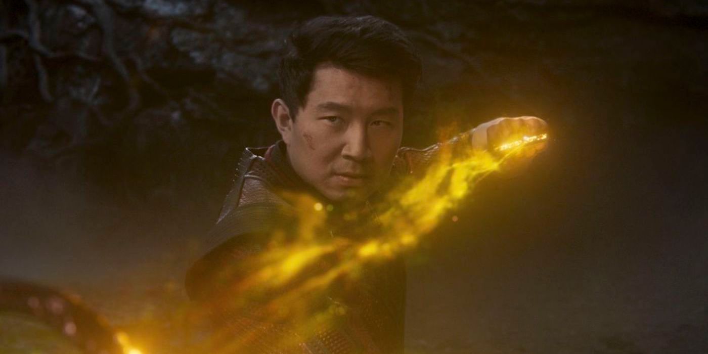 Simu Liu wielding the ten rings that are now yellow in color in Shang-Chi