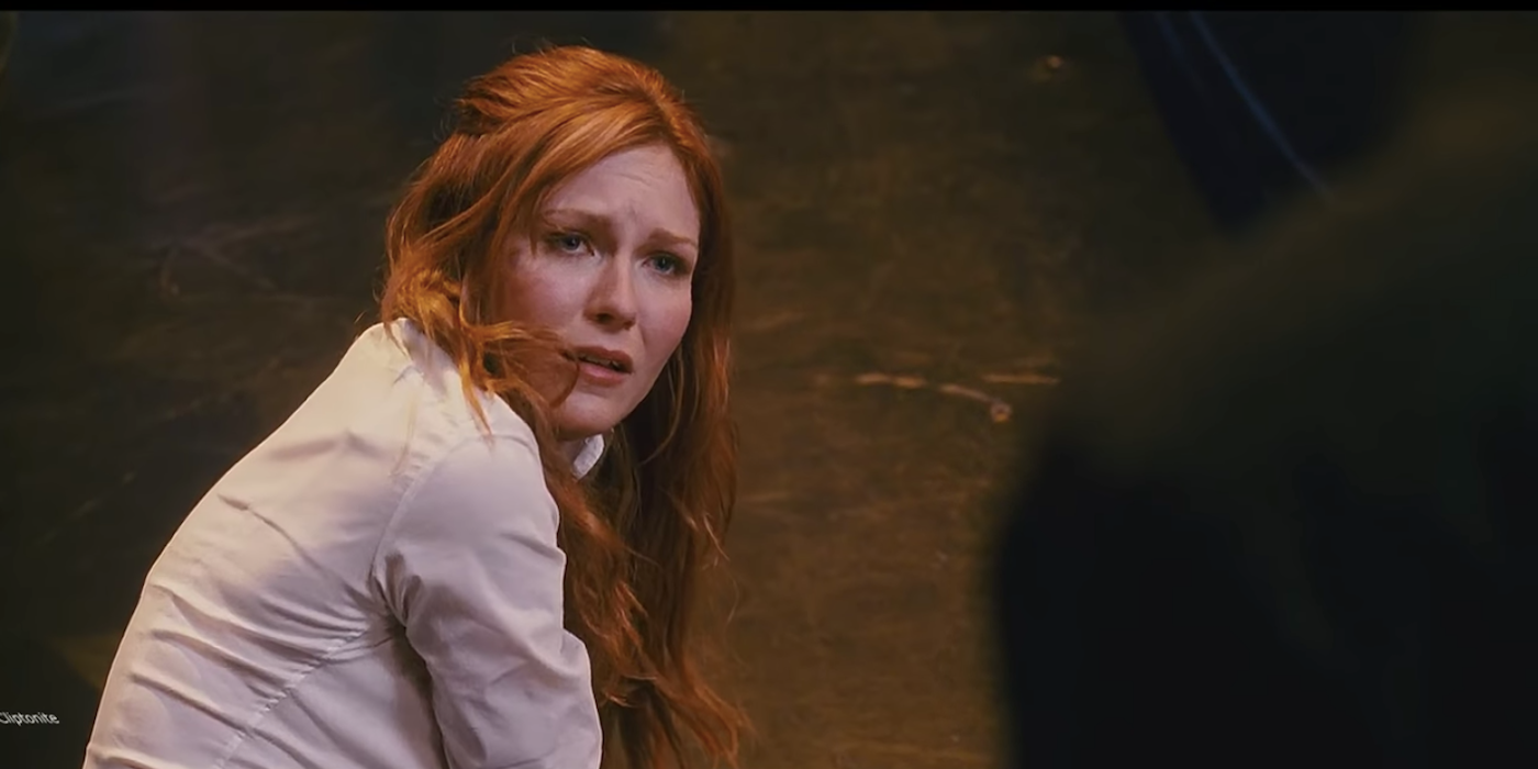 Kirsten Dunst as Mary Jane on the floor looking up with a devastated look on her face in Spider-Man 3