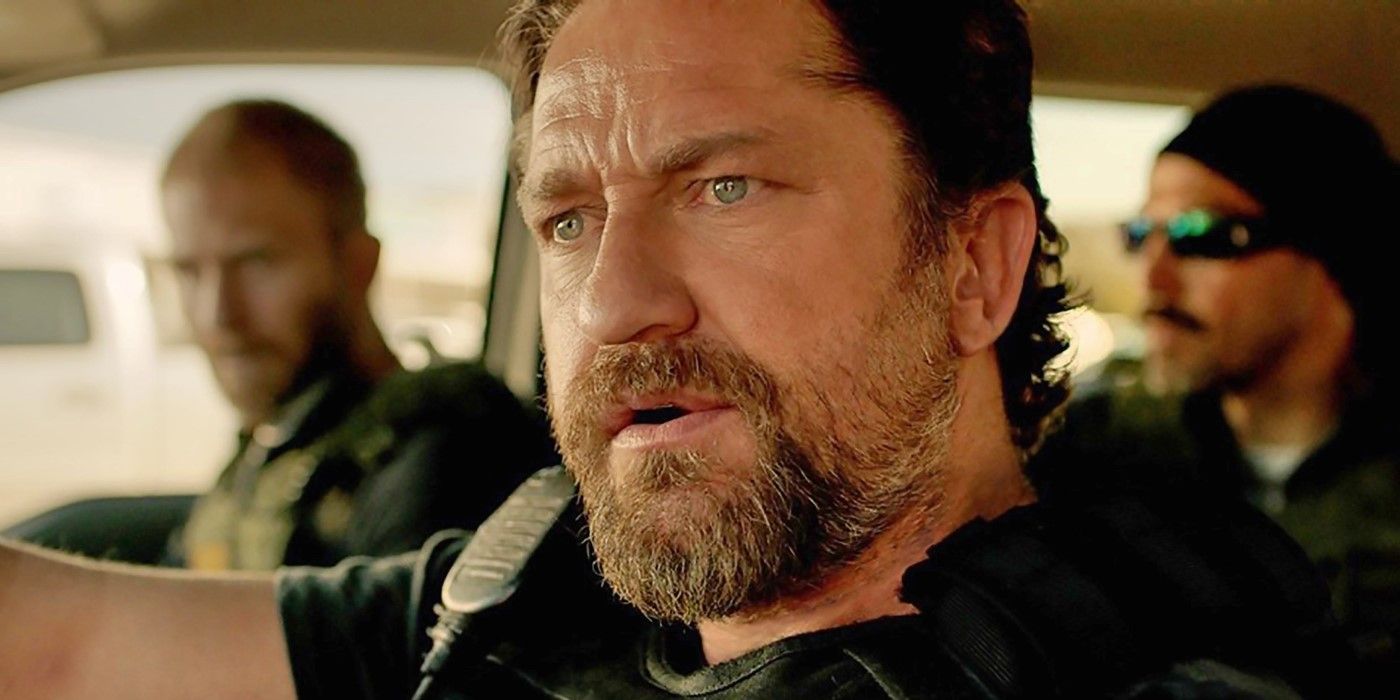 Gerard Butler driving in Den of Thieves