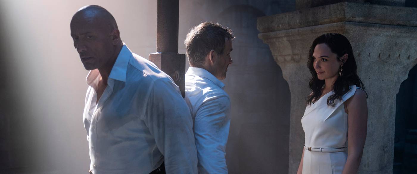 Red Notice Trailer Reveals Ryan Reynolds, Dwayne Johnson, and Gal Gadot&#39;s  Heist Film on Netflix