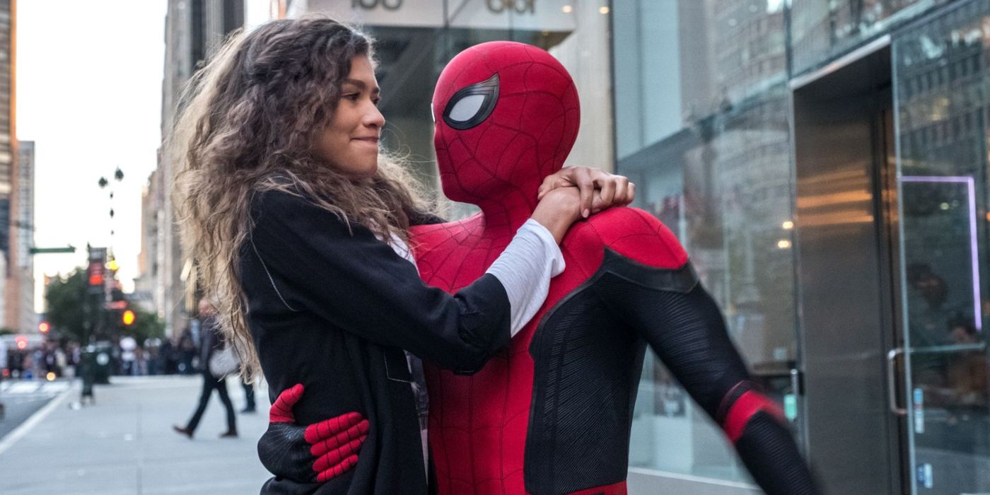MJ holding on to Spider-Man as they land on an NYC sidewalk in Spider-Man: Far From Home