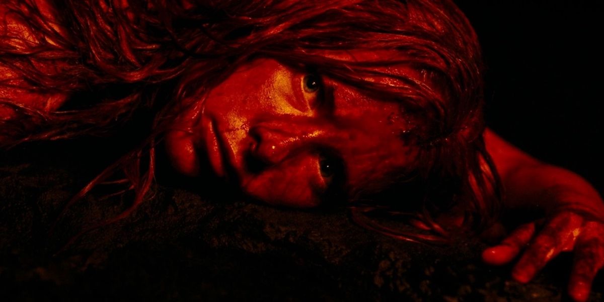 Shauna Macdonald bloodied on the floor in The Descent