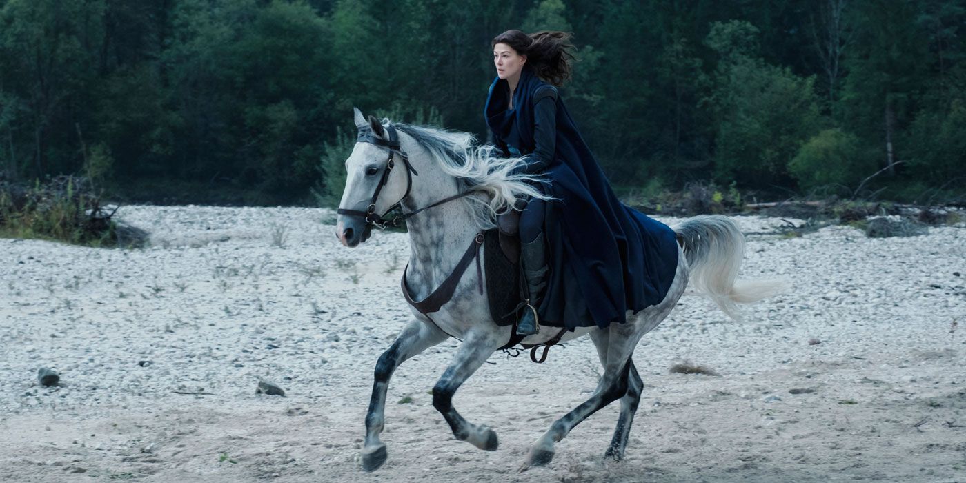 Rosamund Pike riding a horse in 